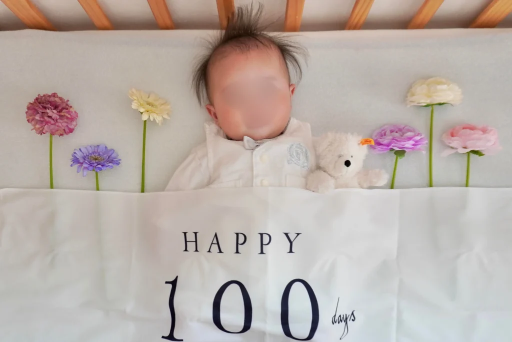 タペストリーを使った百日祝のおしゃれな写真