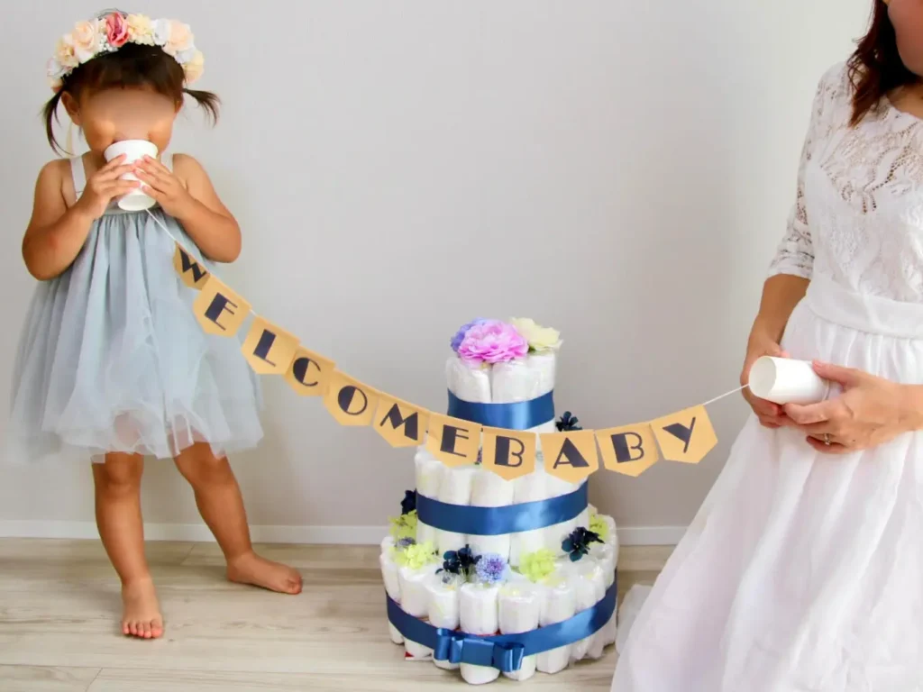 ウェルカムベイビーのガーランドを使ったマタニティフォト